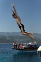 Thomas jumps off the boat